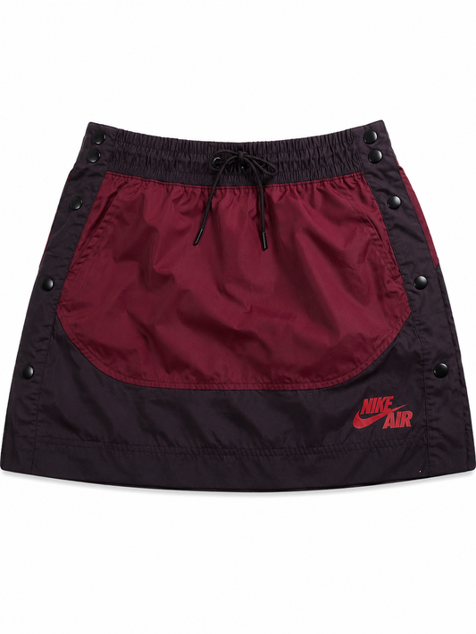 Jupe sport bicolore bordeaux et noir à boutons pression